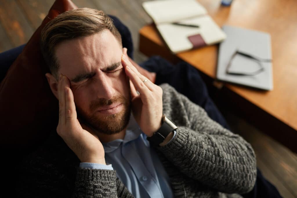 businessman has a headahed